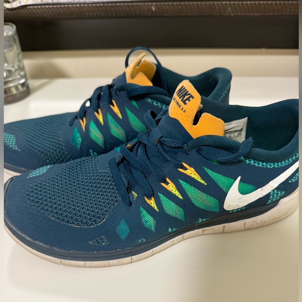 Nike Teal and Yellow Running Shoes
